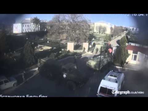 Footage shows Russian troops storming airbase