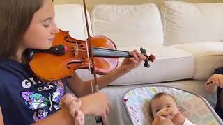 Carolina and brother playing for their little brother ..