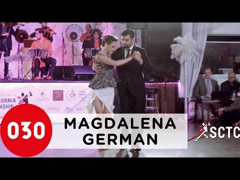  Magdalena Gutierrez  and  German Ballejo  are  dancing  to  the  milonga  "  Milonga Del Ochenta Y Tres  "  by  Juan D'Arienzo  in  2019