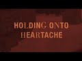 Louis Tomlinson - Holding On To Heartache (Official Audio)
