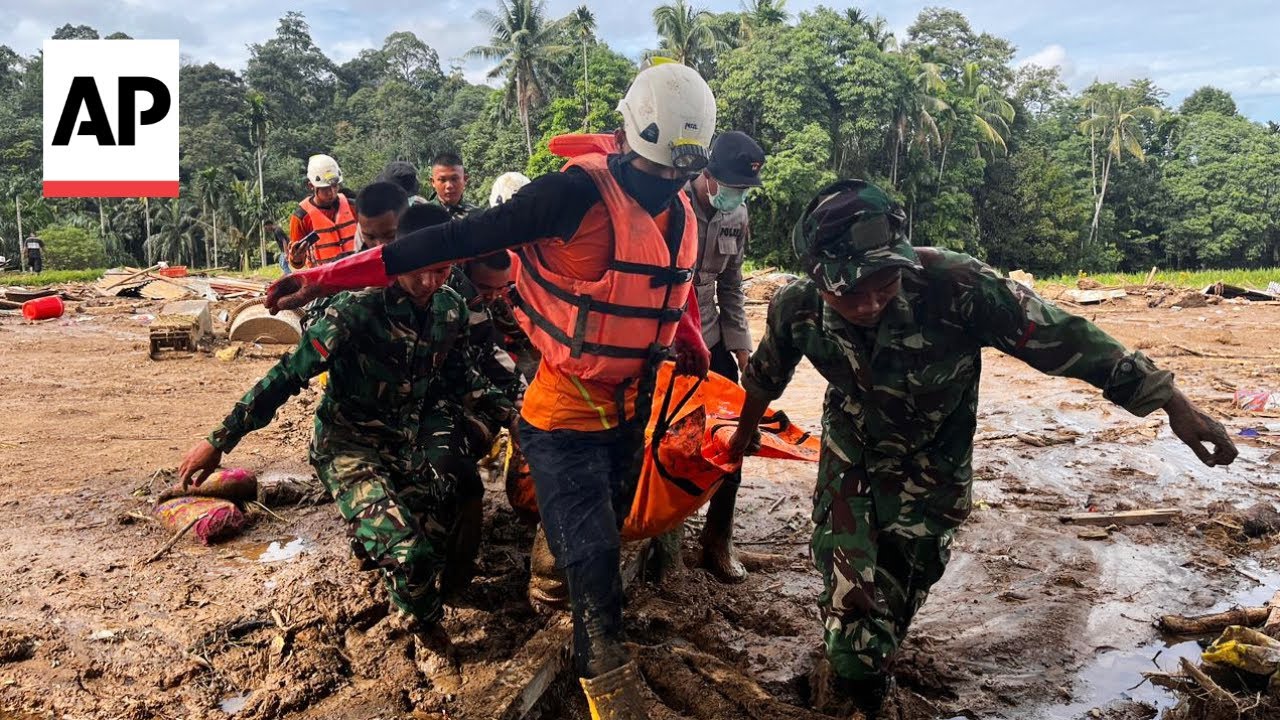 Rescuers search for flood victims in Indonesia as death toll rises