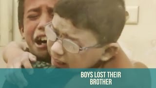 Heartbreaking Syria footage shows two young boys mourn the death of their brother