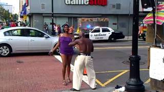 Old head and some chick busting moves on Broad and Market...