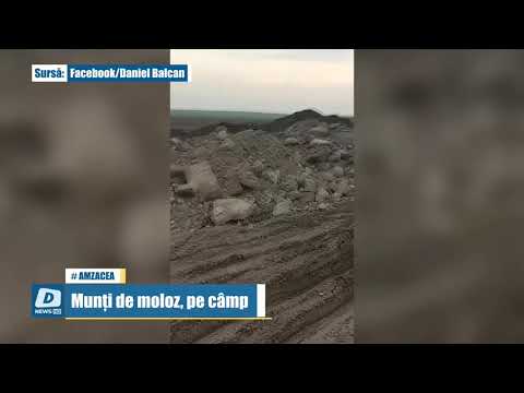 Munți de moloz, pe câmp în Amzacea