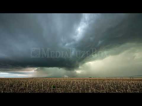 Stock Video - Time lapse of tornado warned supercell storm rolling through the Nebraska plains