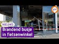 Brandend busje aangetroffen in fietsenwinkel in Nijmegen