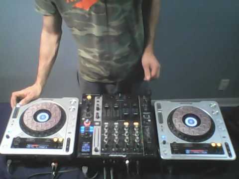 Dj Lil' Jerk mixing house music.