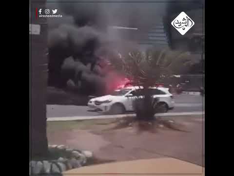 شاهد بالفيديو.. احتراق سيارة اجرة امام مول بغداد في منطقة الحارثية