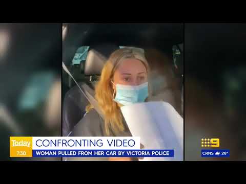 Thumbnail for Woman dragged out of her own car bu Victoria police by car bu