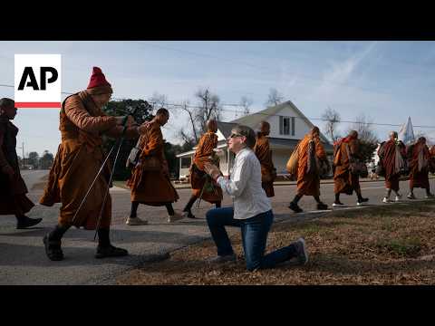 Buddhist monks and their dog captivate Americans while on peace walk