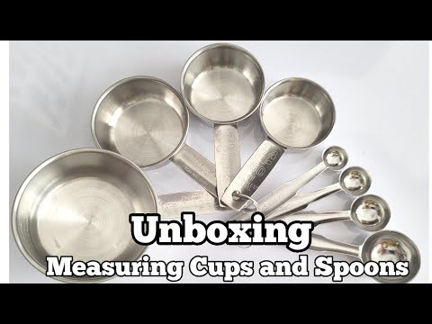 Silver stainless steel measuring cups and spoon 4 cups and 4...