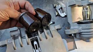 Swapping phenolic pistons for steel ones in Mustangs new edge/ PBR calipers.