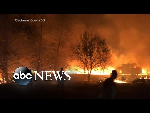 Death toll growing in explosive wildfires in the West