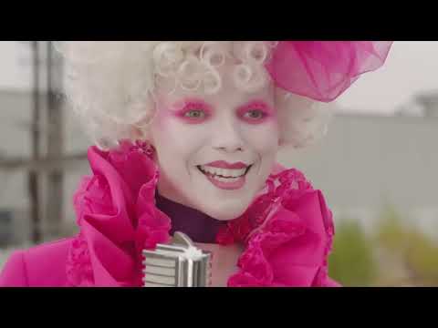 Trailer still: Kantmiss running through forest as percussion and synths drive the scene