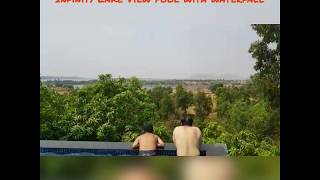 preview picture of video 'Nearby Mumbai Lake side hill resorts with Infinity Lake View pool with waterfall sitout at Igatpuri.'
