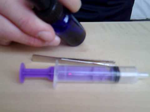Part of a video titled HOW TO EXTRACT JUICE FROM DEAD E-CIG CARTS - YouTube