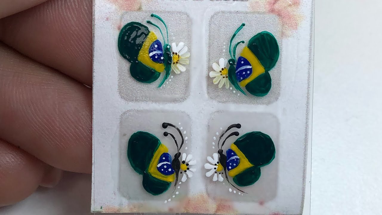 Adesivos caseiros para unhas: borboletas com bandeira do Brasil
