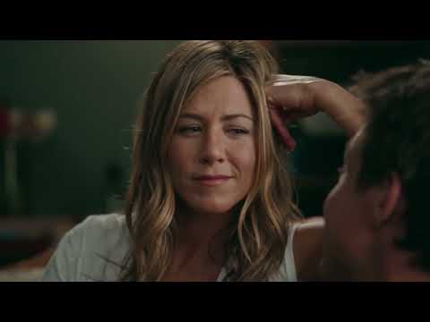 The Switch trailer still: party crowd and turntable lights during the insemination bash sequence