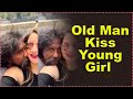 Old Man Kiss Young Girl In Public Place