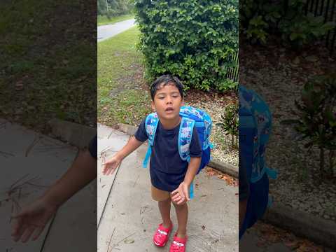 Mom and dad catch son waiting at bus stop but there’s no school during hurricane #shorts