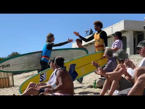 Joel Tudor & Kaniela Stewart hugging with respect Malibu