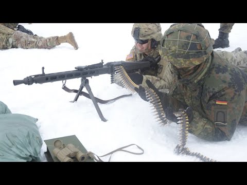 American Soldiers trying to fire German Army MG-3 Machine Gun