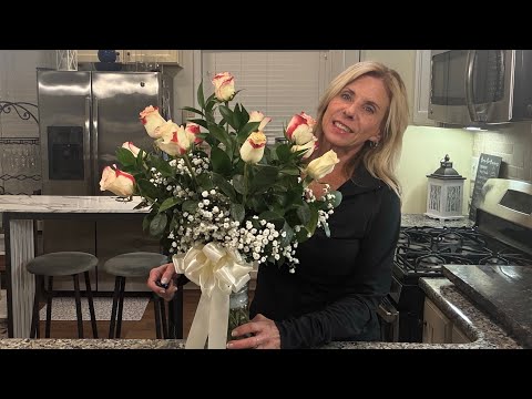 Part of a video titled How to Arrange a Dozen Roses in a Vase @DesignbyElisa - YouTube