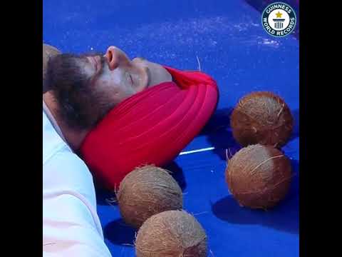 Most Coconuts Smashed Around A Person Blindfolded - Guinness World Records