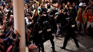 video: Chaos at Barcelona airport as protesters clash with police after independence leaders jailed