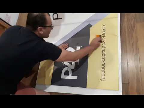 P42 - Sticking a sticker on Komatex PVC sheet