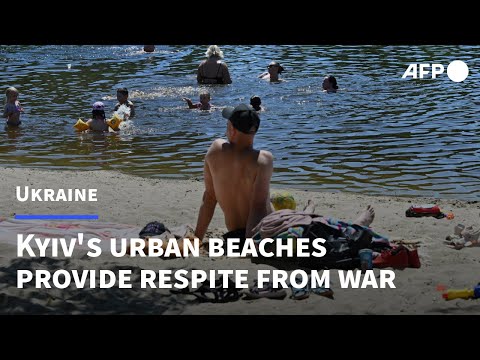 Ukrainians look to Kyiv beaches as respite from war | AFP