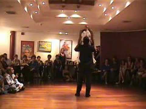  Lina Valencia  and  Edwin Chica  are  dancing  to  the  vals  "  Quiero Ser Tu Sombra  "