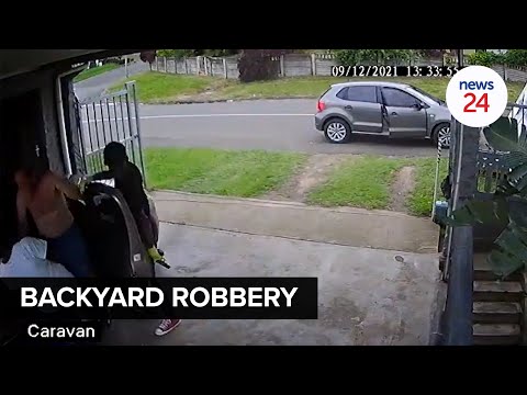 WATCH | Armed men slip through seconds before gate closes and rob Durban residents of jewellery