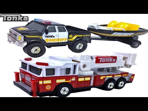 TONKA METAL SETS WITH RESCUE FIRETRUCK 4X4 HAULERS CARRYING AN ATV SHERIFF POLICE TRUCK AND JEEP