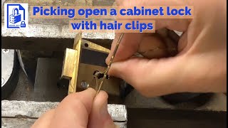 605. Picking open a basic wardrobe desk cabinet lever lock with Bobby pins / hair clips / hair grips