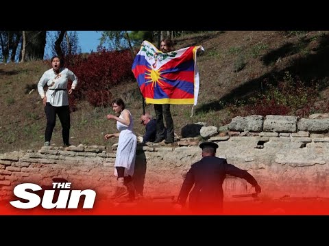 Protestors crash Beijing 2022 Olympics flame lighting ceremony