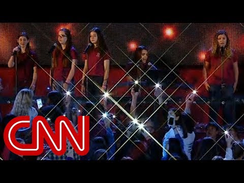 Student's sing moving tribute to shooting victims