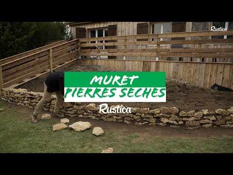 Comment transformer un talus enherbé en rocaille - 2-  monter un muret en pierres sèches.