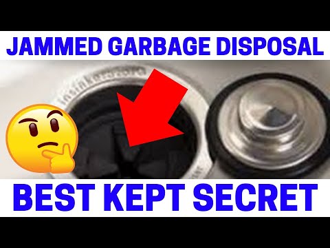 image-How do you remove a foreign object from a garbage disposal?
