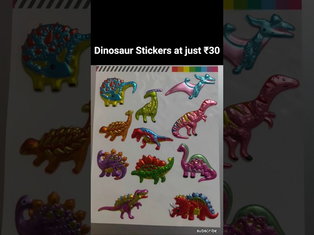 Vídeo relacionado con Baker Ross- Pegatinas de espuma con forma de dinosaurios (Pack de 120) - Pegatinas de espuma con temática de dinosaurios en divertidas formas para decorar libros de recortes