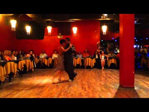  Andres Laza Moreno  and  Luciana Arregui  are  dancing  to  a  tango