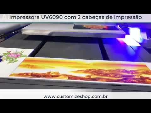 Impressora UV6090 com duas cabeças de impressão.