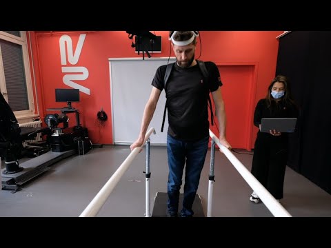 Paralyzed man walks again with help of 'brain bridge' implant