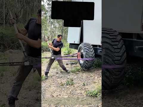 Pulling Tire: How Leverage Tools Safely Remove Stuck Off-Road Vehicle Tires