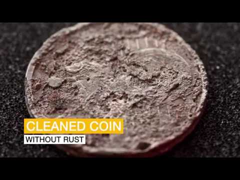 Cleaning rusted coins with electrolysis
