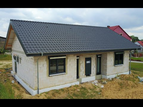 Salamander 92+HST, kolor Antracyt. Ciepły warstwowy montaż okien, ciepłe parapety. Dom parterowy