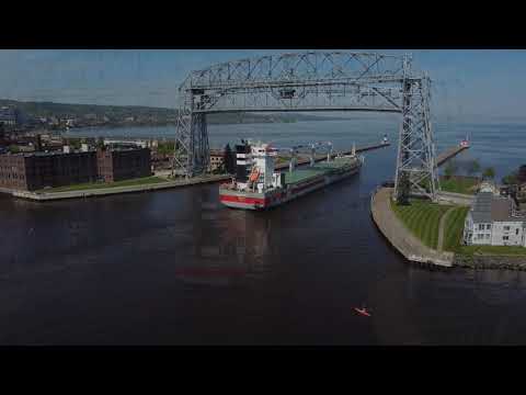 Duluth, Minnesota June 4, 2021 Ship passing under the lift bridge.