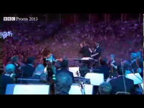 The Doctor appears at the conductor's podium   Doctor Who Prom 2013