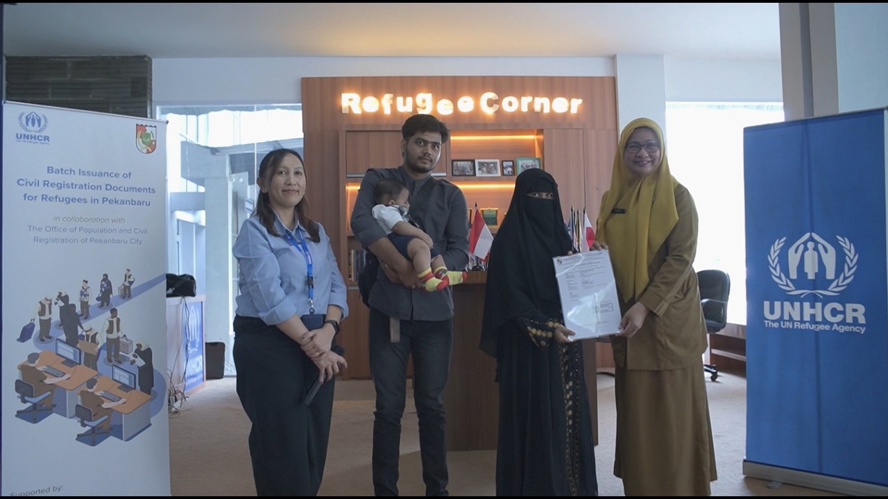 Ceremonial Distribution of Civil Registration Documents for Refugees Born in Pekanbaru