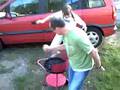 Crazy Man And Girl Blowing On Bbq
